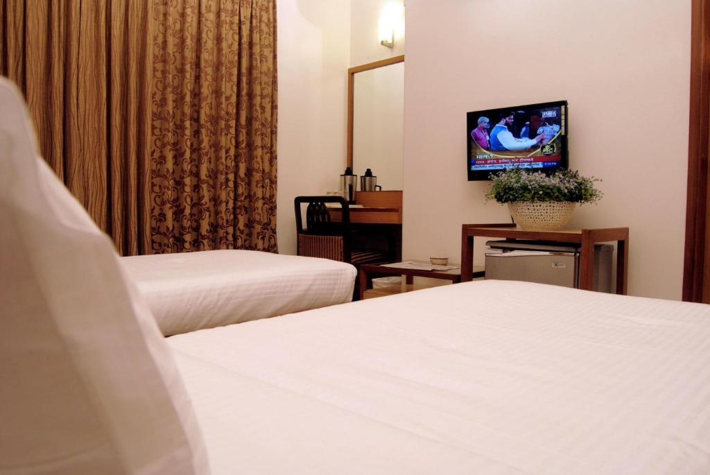 The Ambience Hotel Pune Camera foto